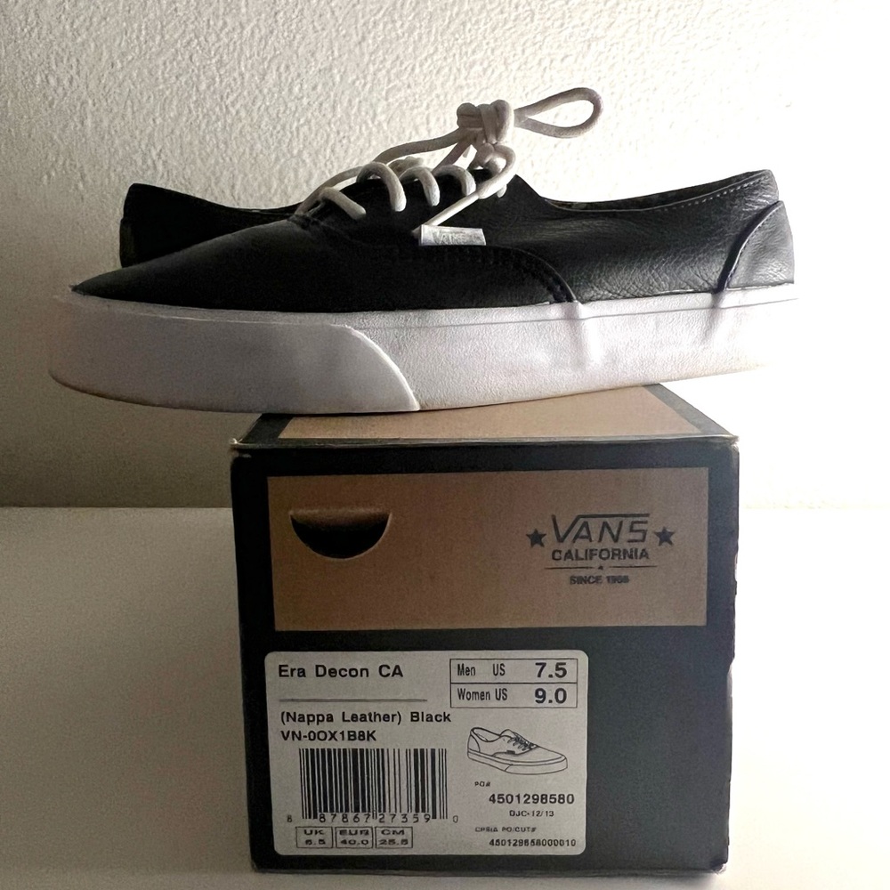 ADORABLE Vans black leather lace ups with comfort sole.